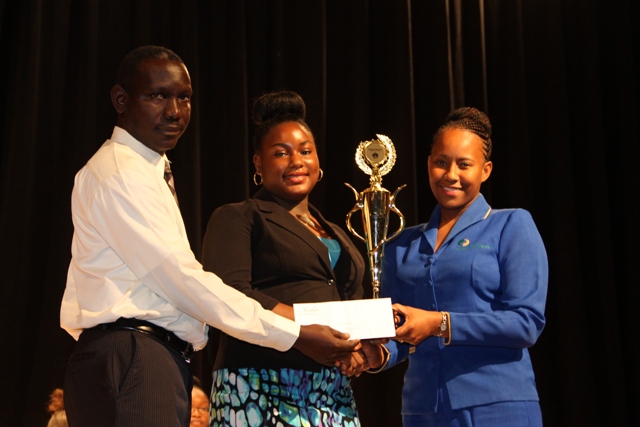(l-r) Euloné Pemberton of the Gingerland Secondary School, Nevis’ 2016-2017 Junior Tourism Minister flanked by (left) Assistant Secretary in the Ministry of Tourism John Hanley and Bank of Nevis Representative Bronte Swanston-Hendrickson at the end of the 2016 Bank of Nevis Ltd. Tourism Youth Congress on May 19, 2016 at the Nevis Performing Arts Centre